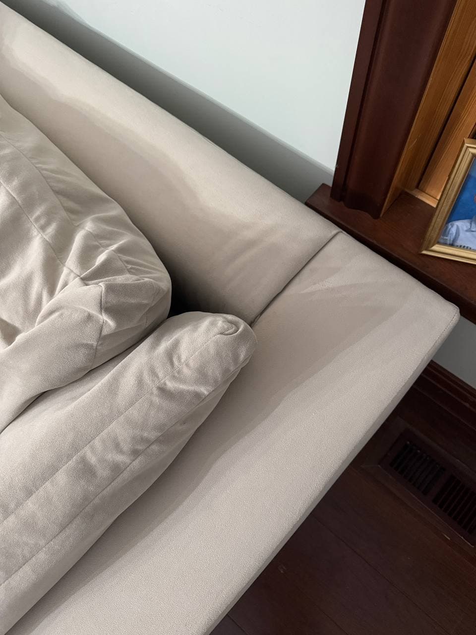 Same couch arm after PureLoom cleaning
