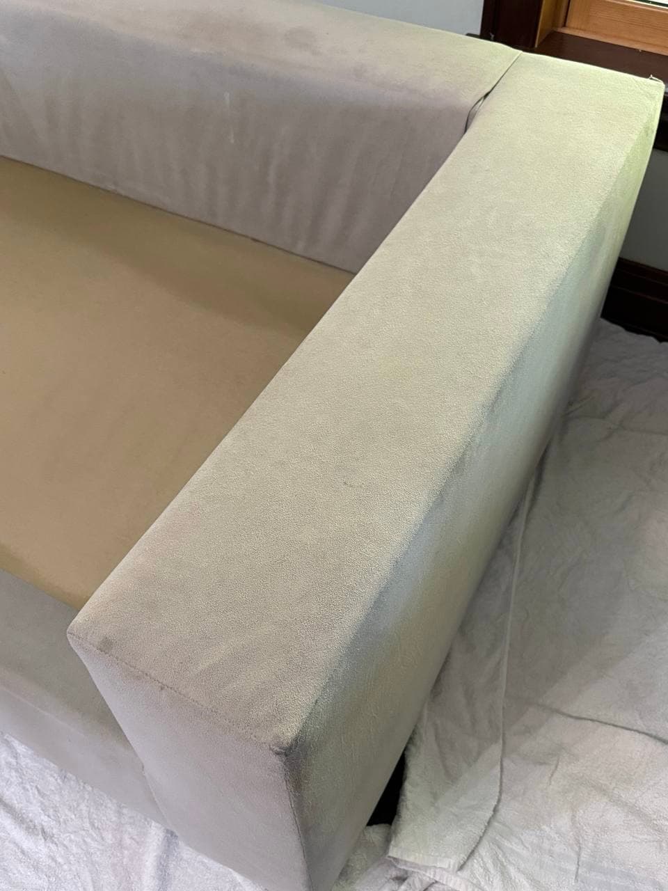 Couch arm before PureLoom cleaning